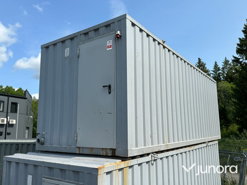 Isolerad 20-fots container med kök, dusch och toalett