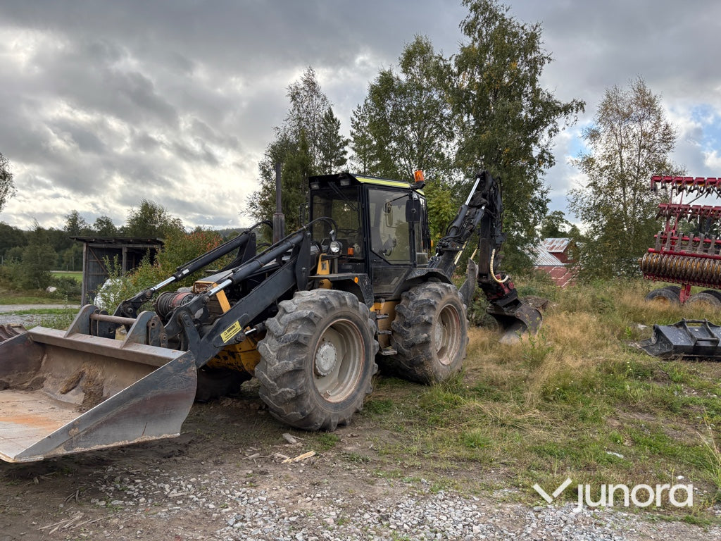 Traktor grävare