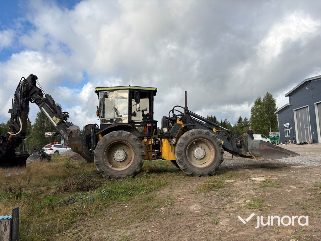 Traktor grävare