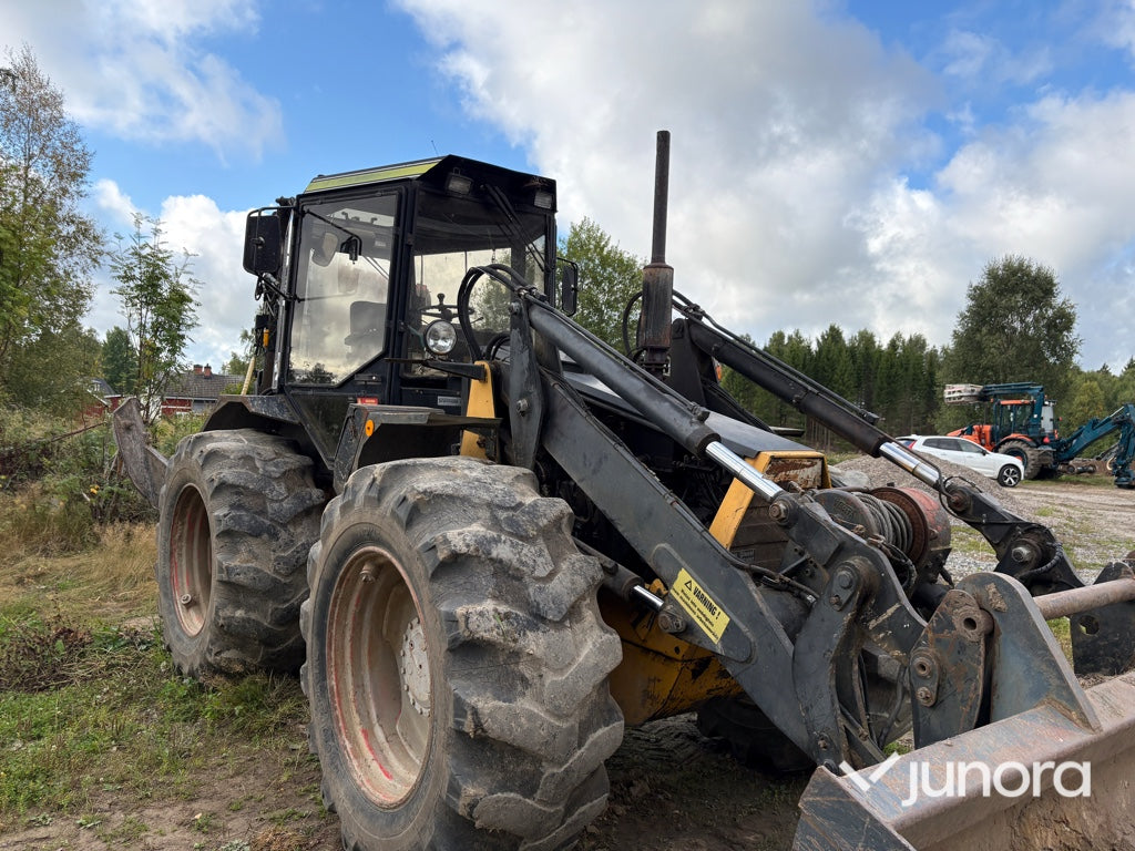 Traktor grävare