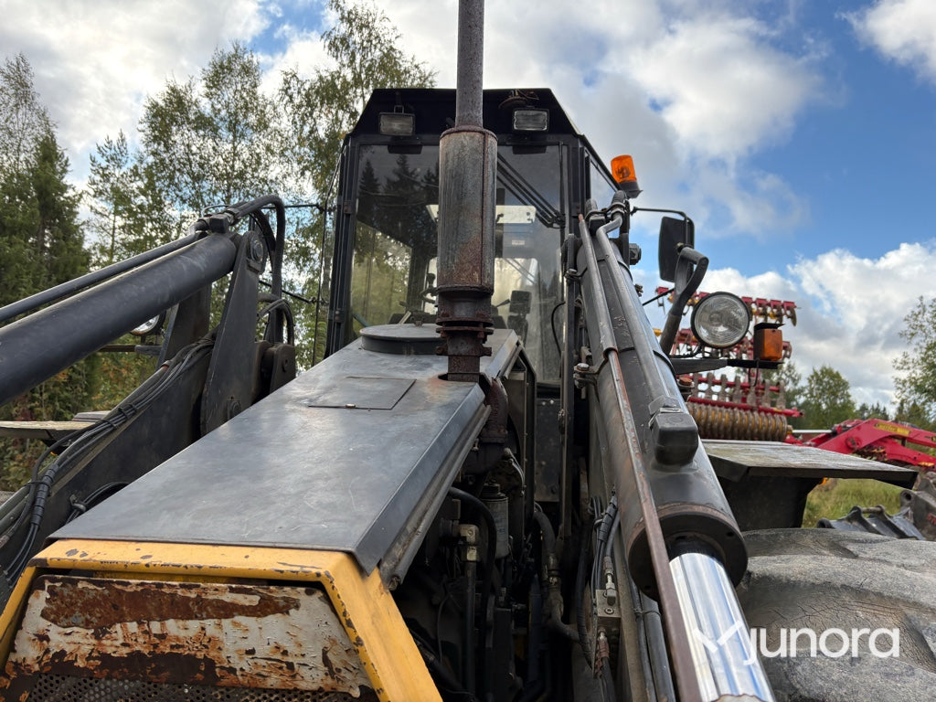 Traktor grävare