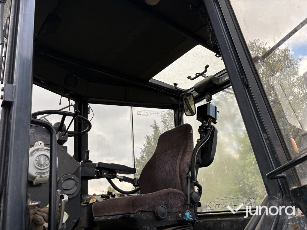 Traktor grävare