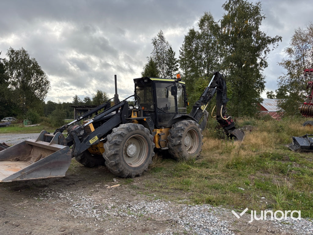Traktor grävare