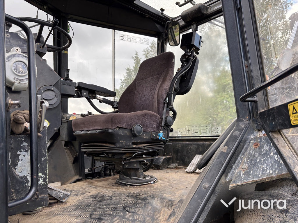 Traktor grävare