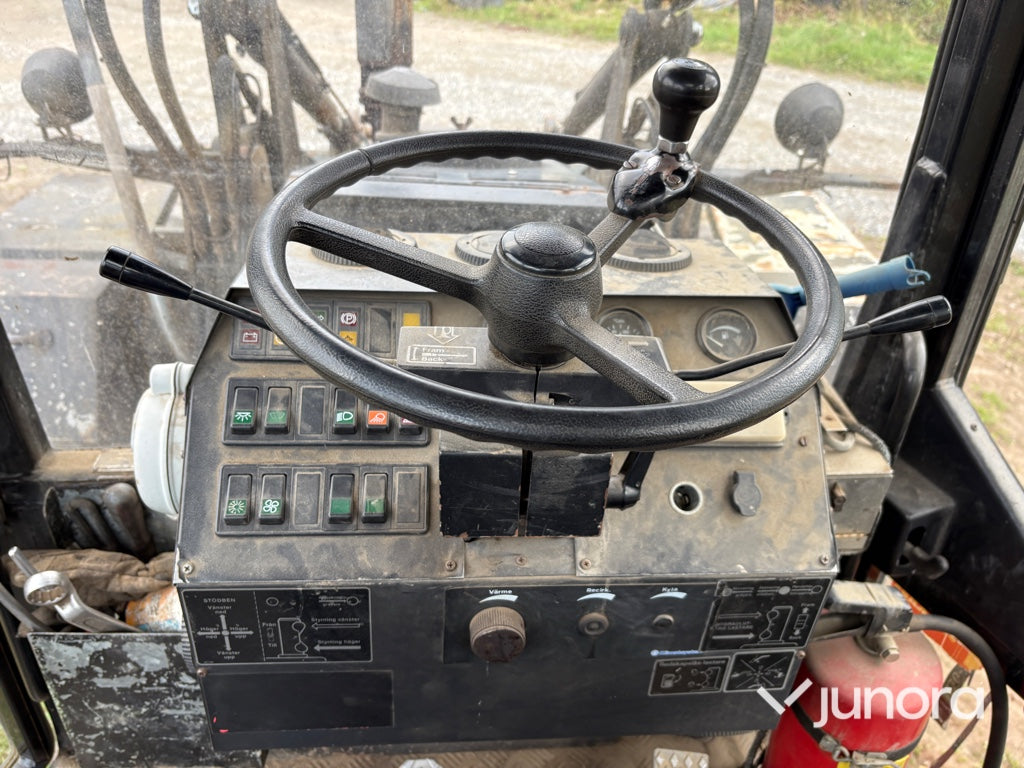 Traktor grävare