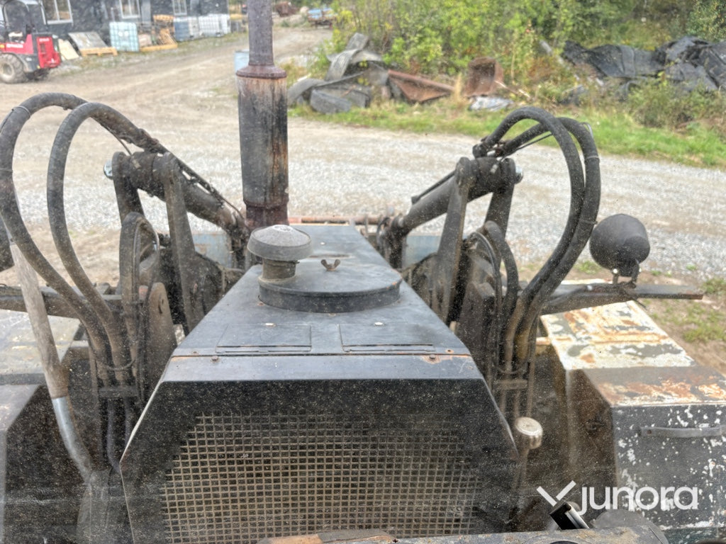 Traktor grävare