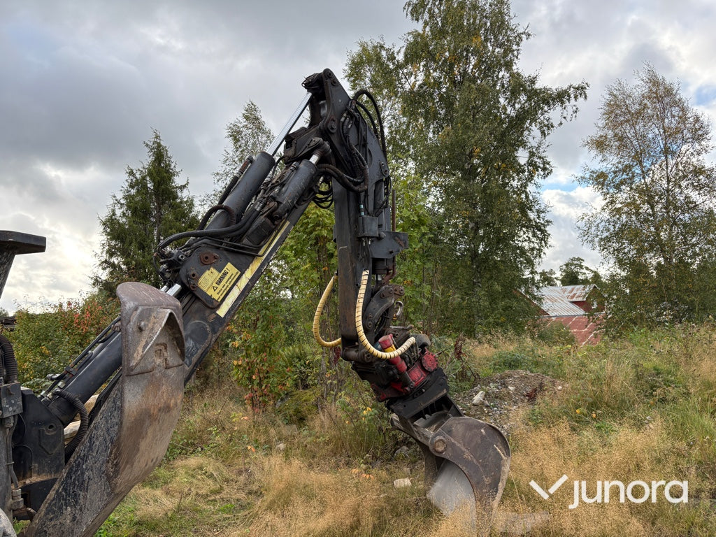 Traktor grävare