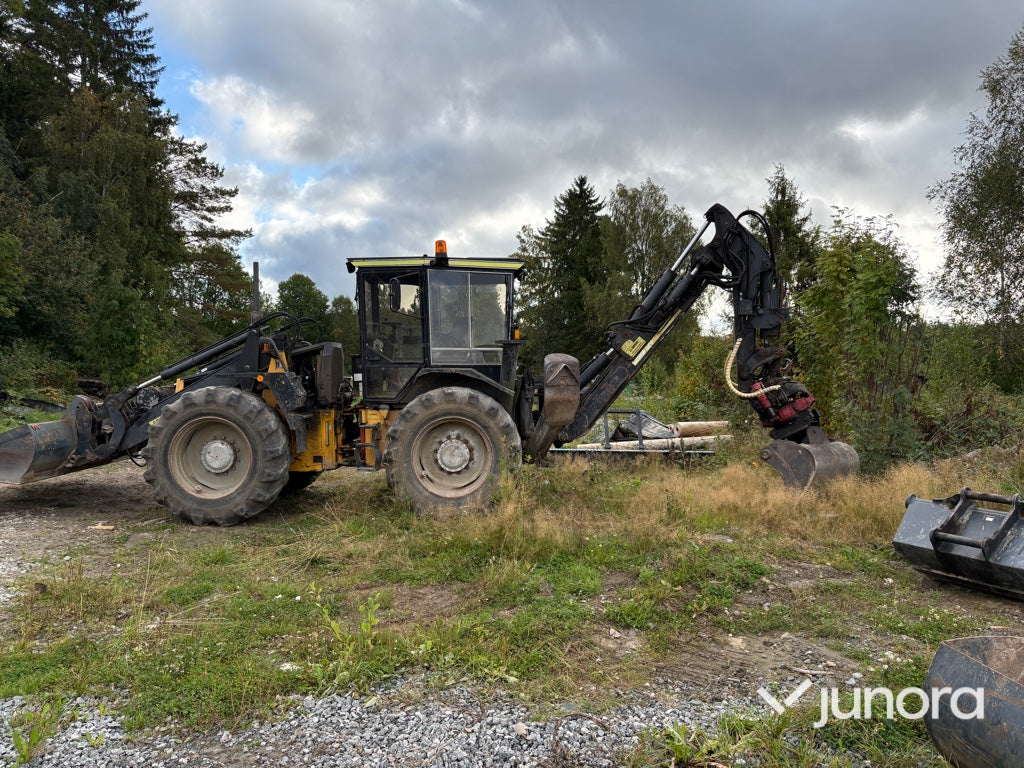 Traktor grävare