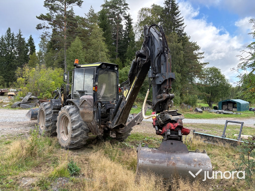 Traktor grävare