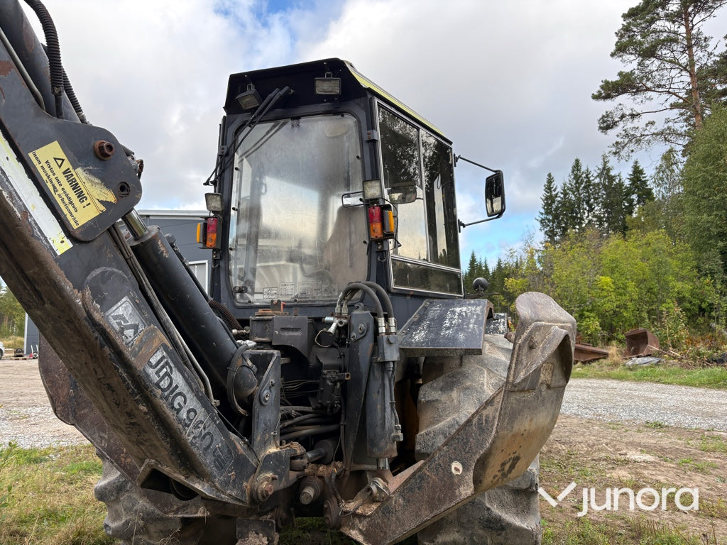 Traktor grävare