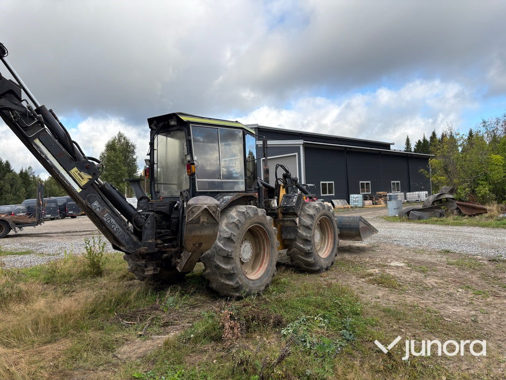 Traktor grävare