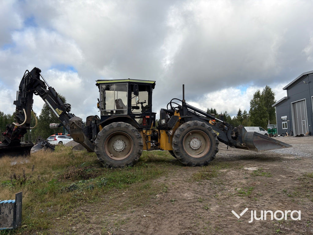 Traktor grävare