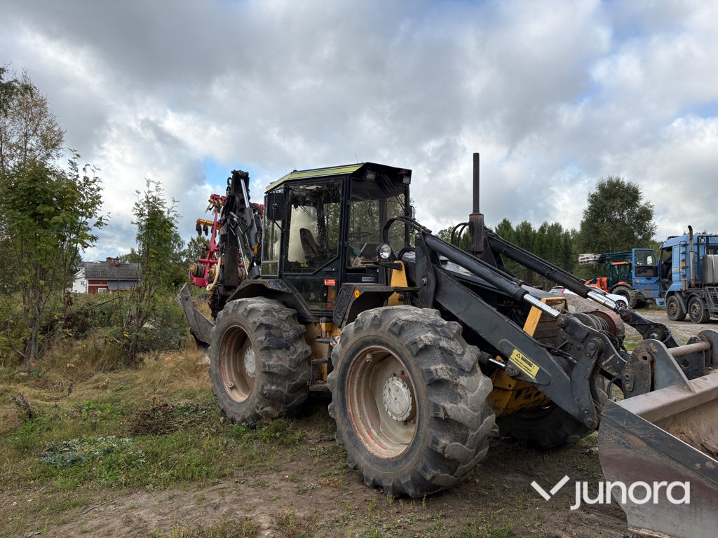 Traktor grävare