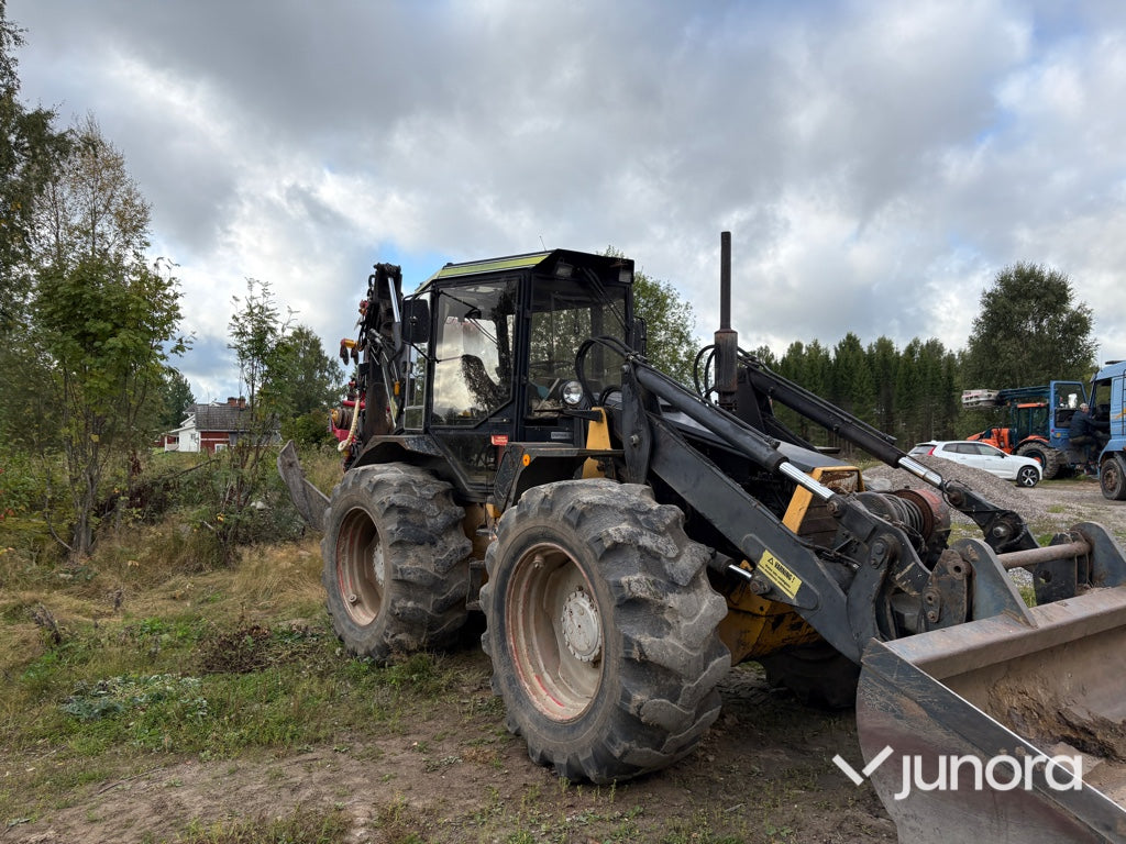 Traktor grävare