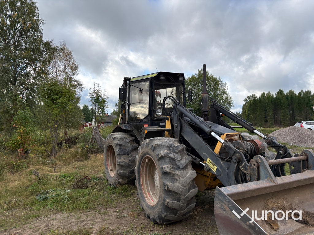 Traktor grävare