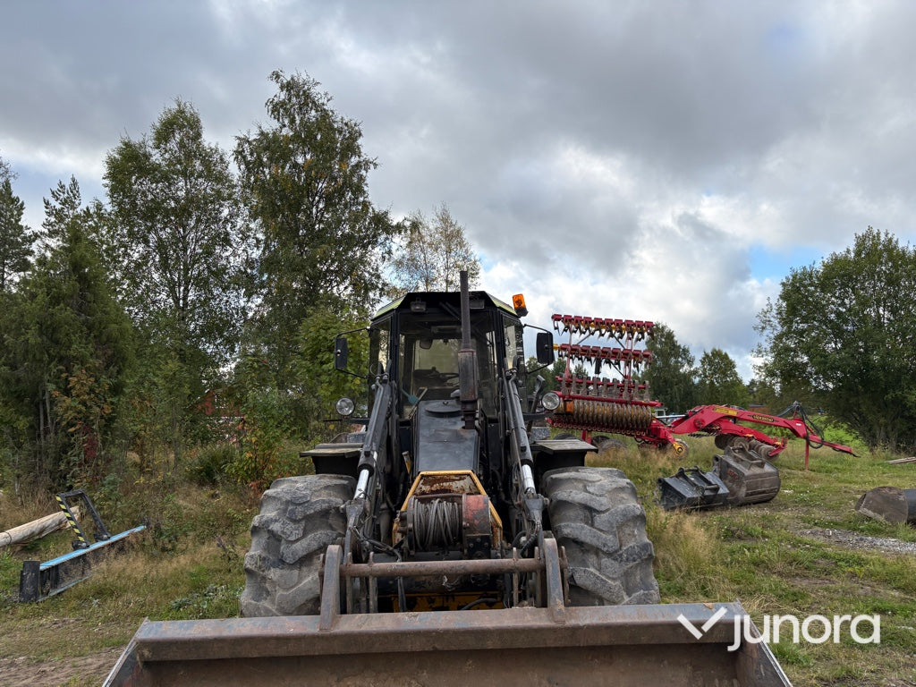 Traktor grävare