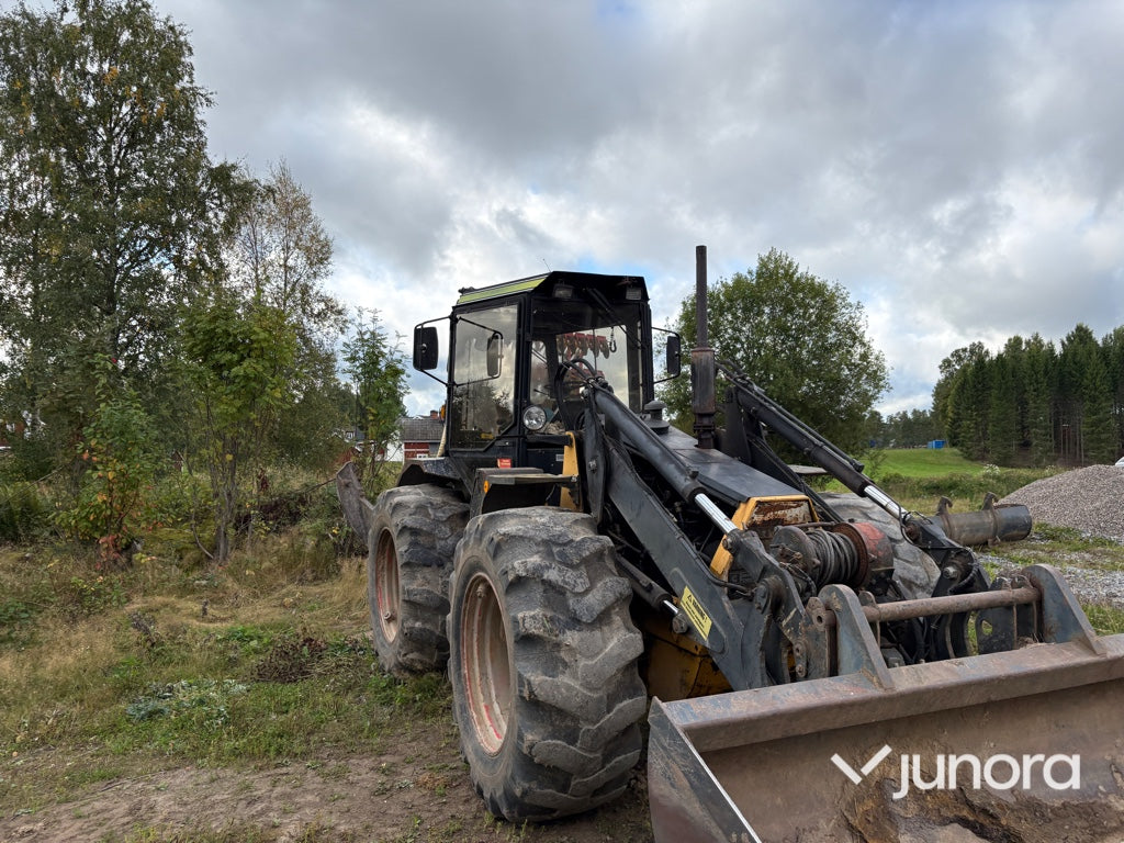 Traktor grävare
