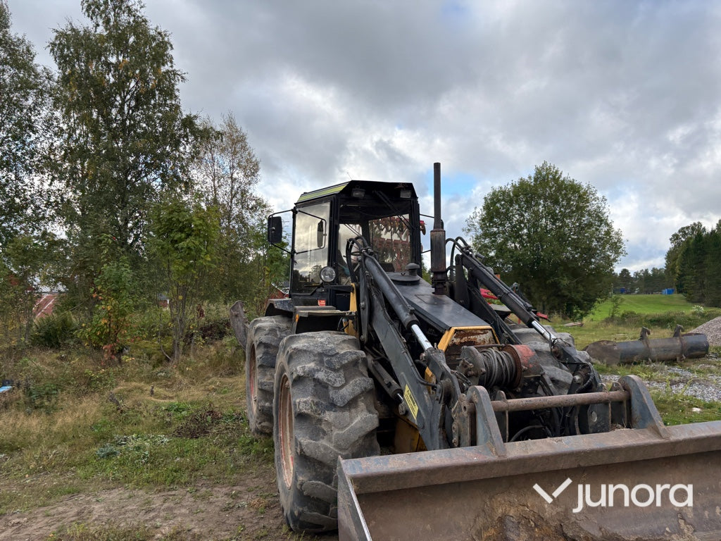 Traktor grävare