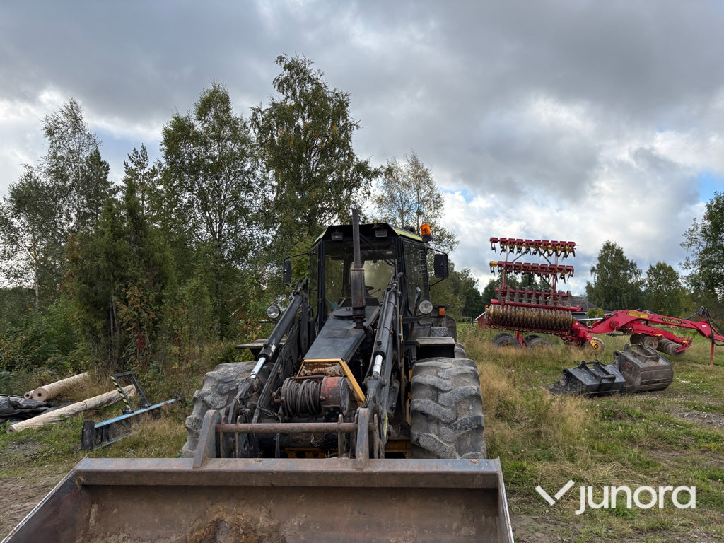 Traktor grävare