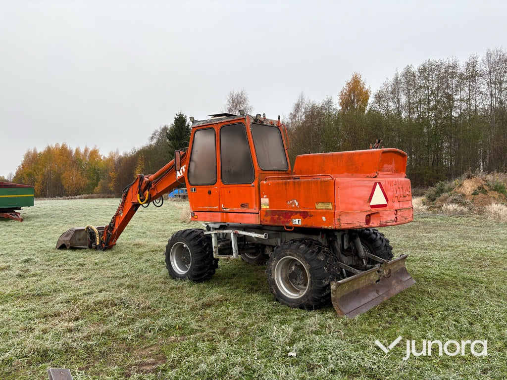 Hjulgrävare - Atlas 1304 med tiltrotator + redskap