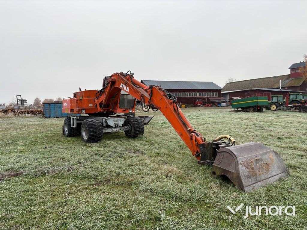 Hjulgrävare - Atlas 1304 med tiltrotator + redskap