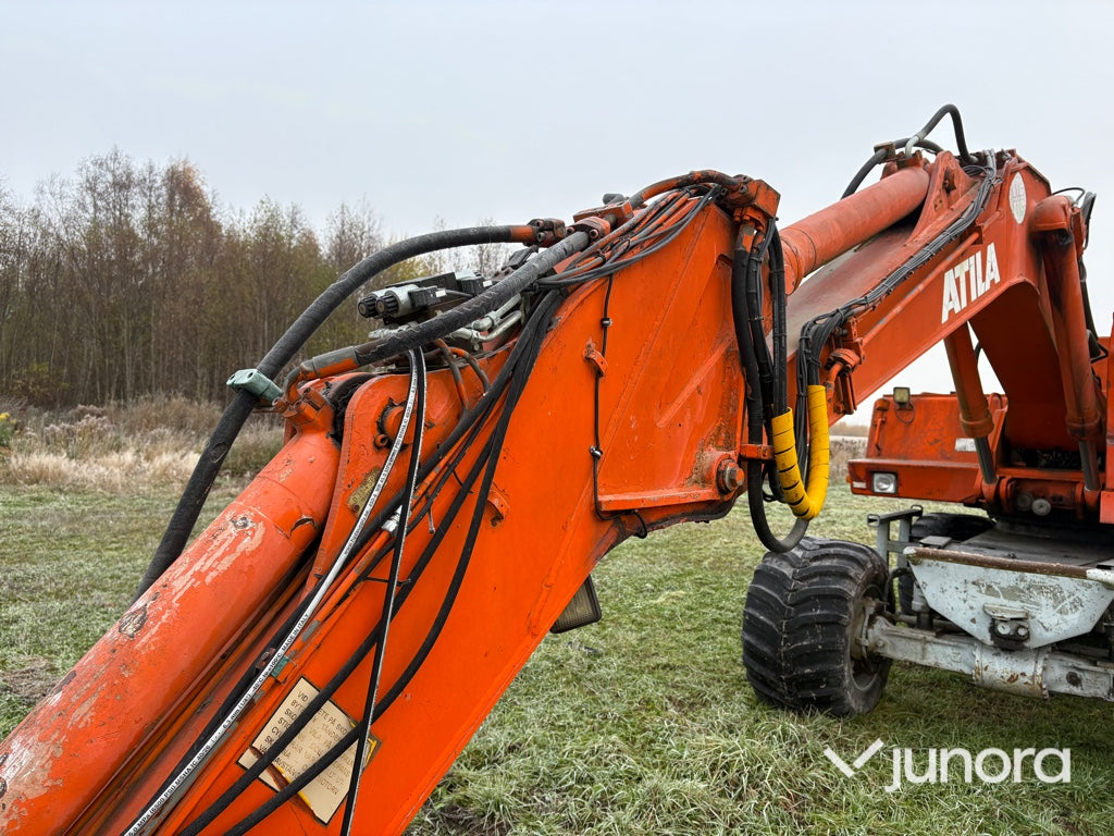 Hjulgrävare - Atlas 1304 med tiltrotator + redskap