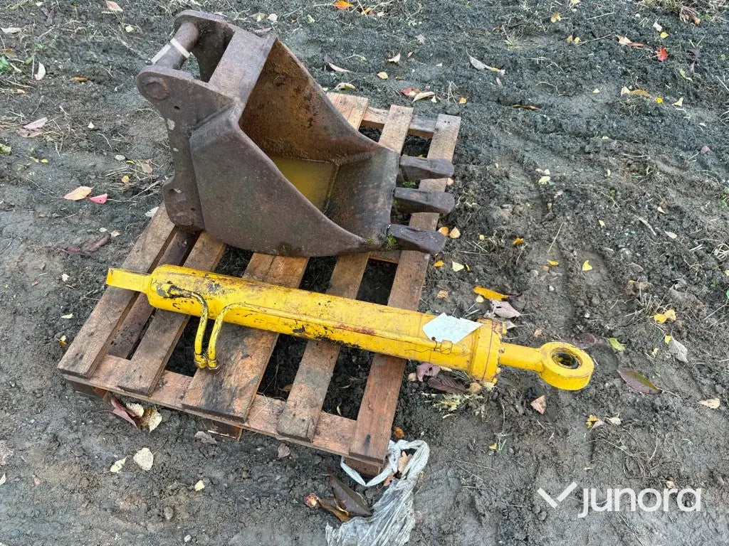 Skopa och hydraulkolv