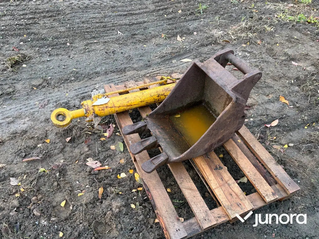 Skopa och hydraulkolv