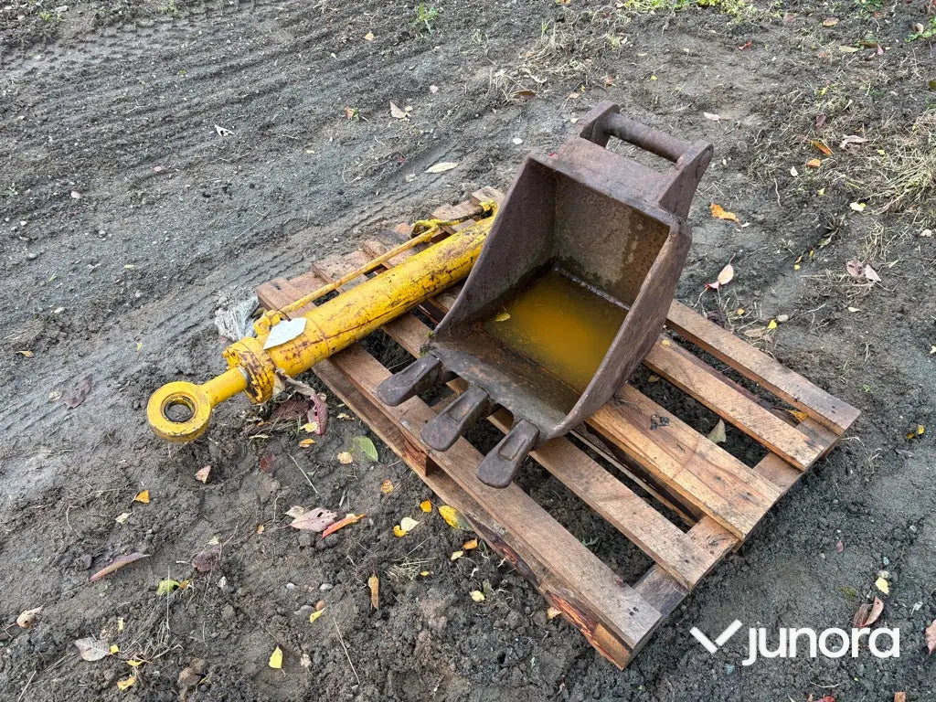 Skopa och hydraulkolv