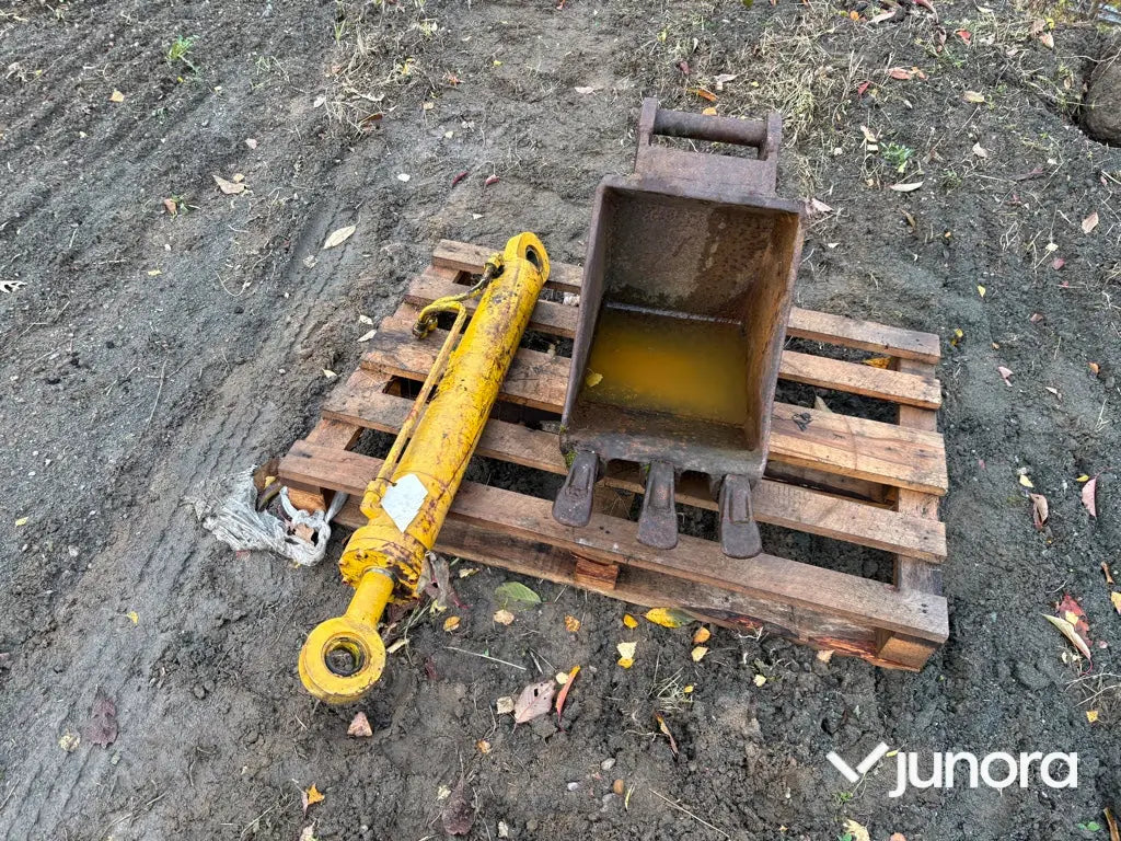 Skopa och hydraulkolv