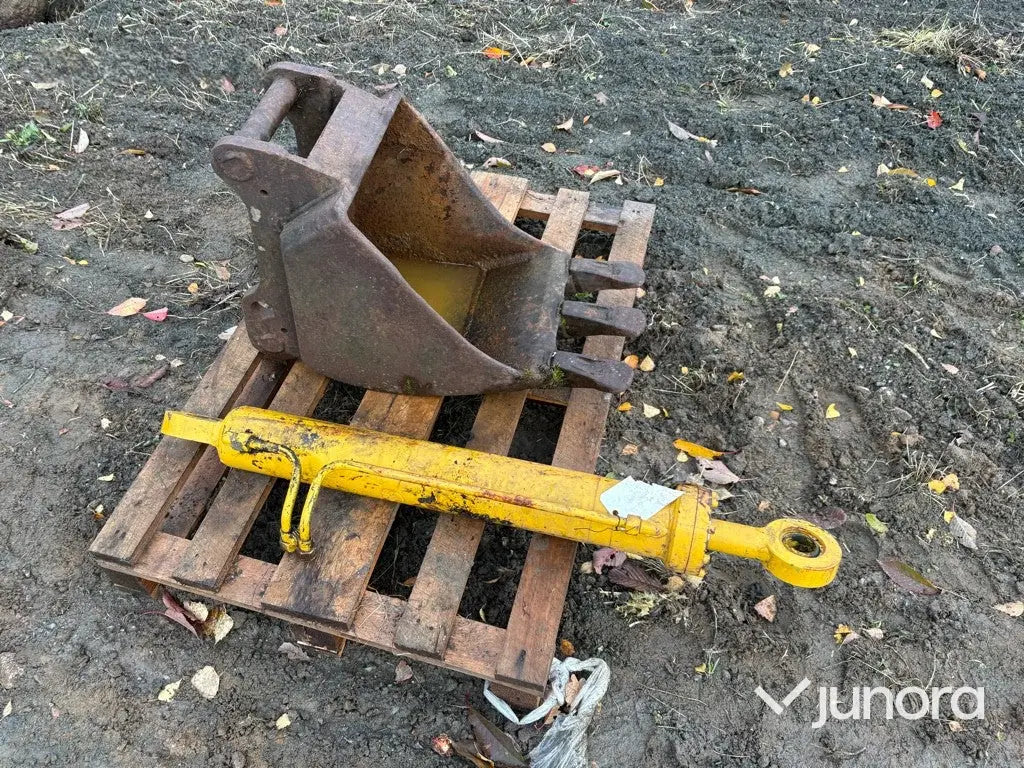 Skopa och hydraulkolv