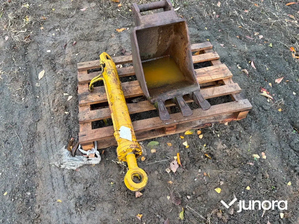 Skopa och hydraulkolv