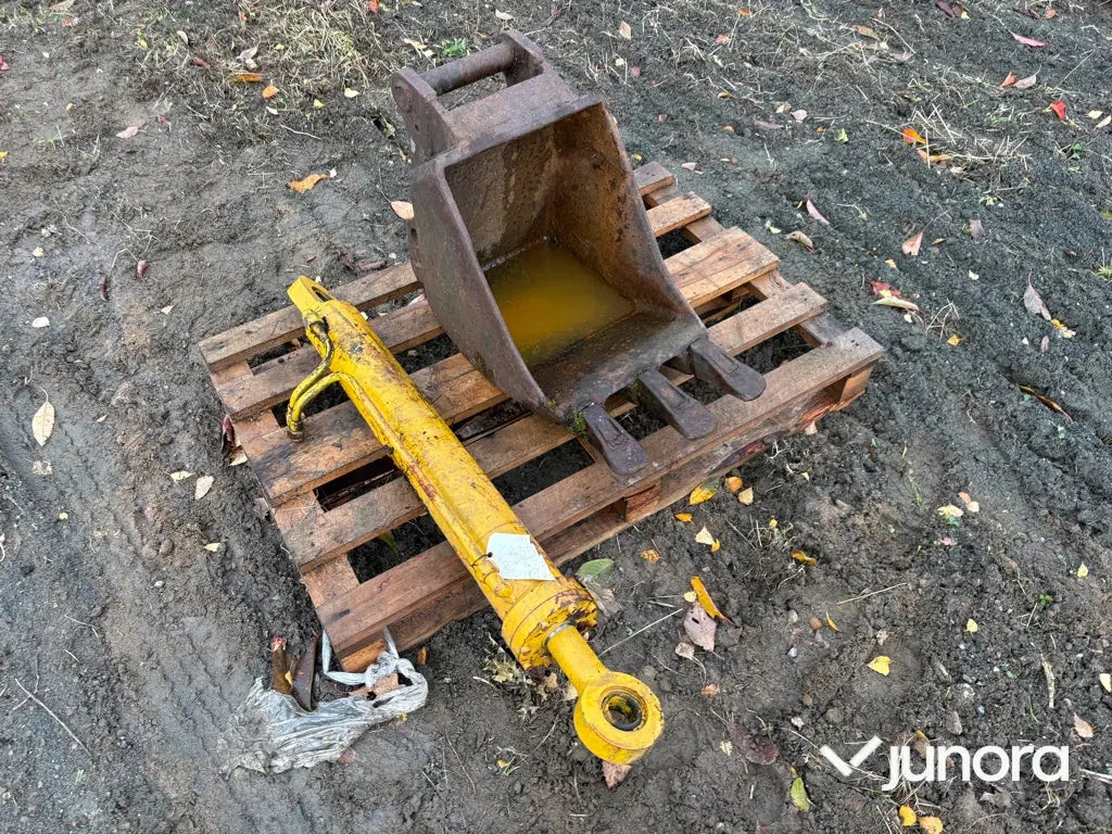 Skopa och hydraulkolv