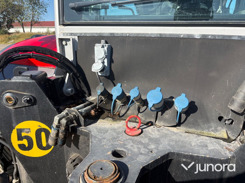 Traktorgrävare Huddig 1260C med redskap