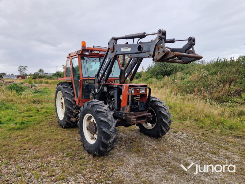 Lastartraktor New Holland 110-90