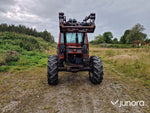 Lastartraktor New Holland 110-90