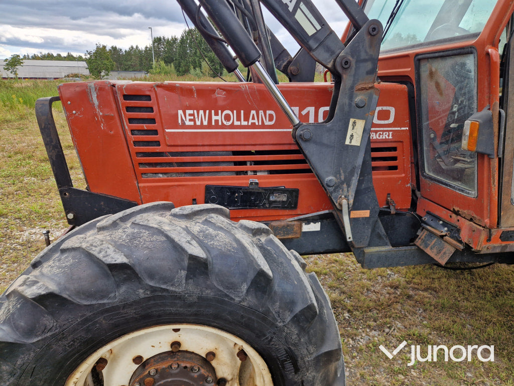 Lastartraktor New Holland 110-90