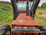 Lastartraktor New Holland 110-90