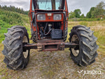 Lastartraktor New Holland 110-90