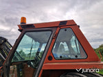 Lastartraktor New Holland 110-90