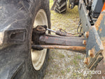 Lastartraktor New Holland 110-90