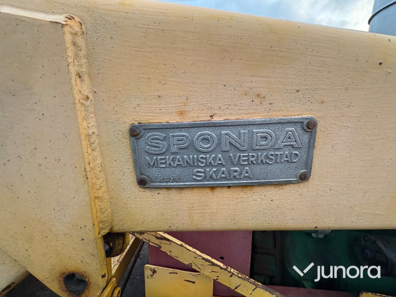 Frontlastare - Sponda