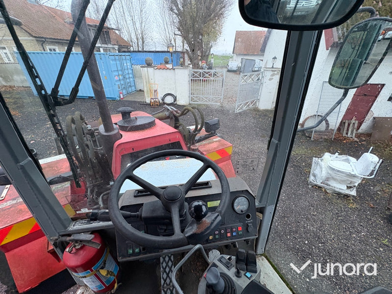 Grävlastare - Huddig, 860