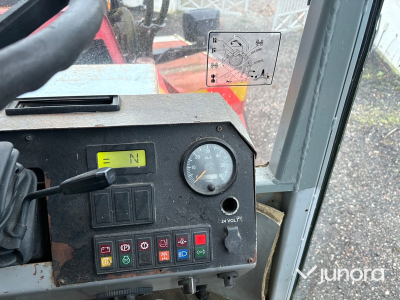 Grävlastare - Huddig, 860