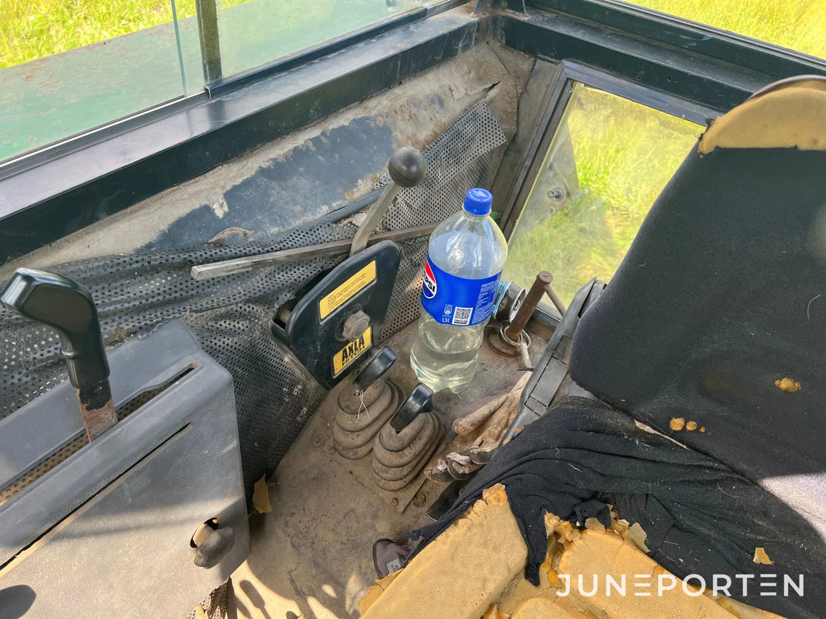 John Deere 2130 med lastare