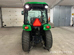 John Deere 3520 med redskap
