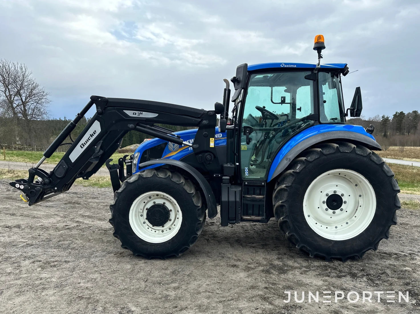 New Holland T5.115 med lastare