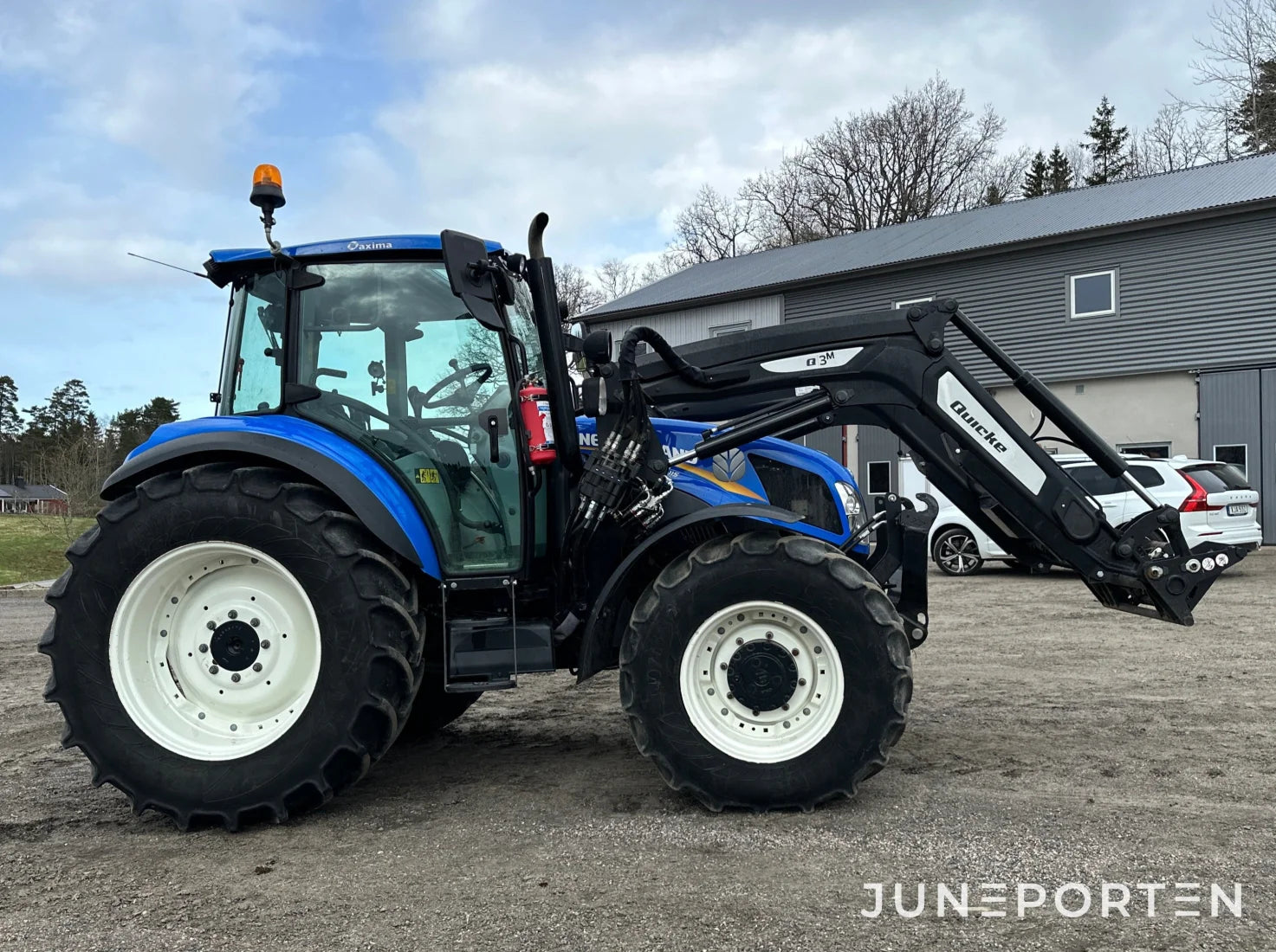 New Holland T5.115 med lastare
