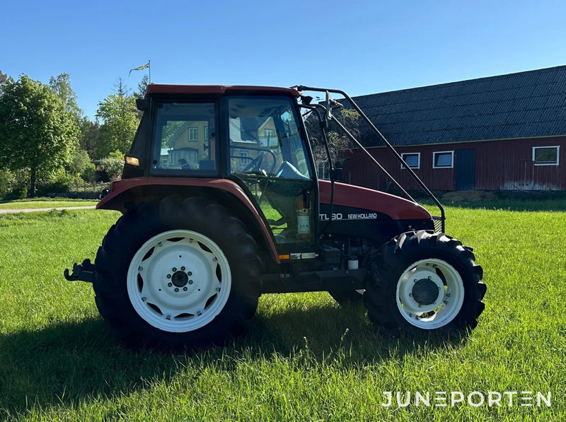 Skogsutrustad New Holland TL80 4WD