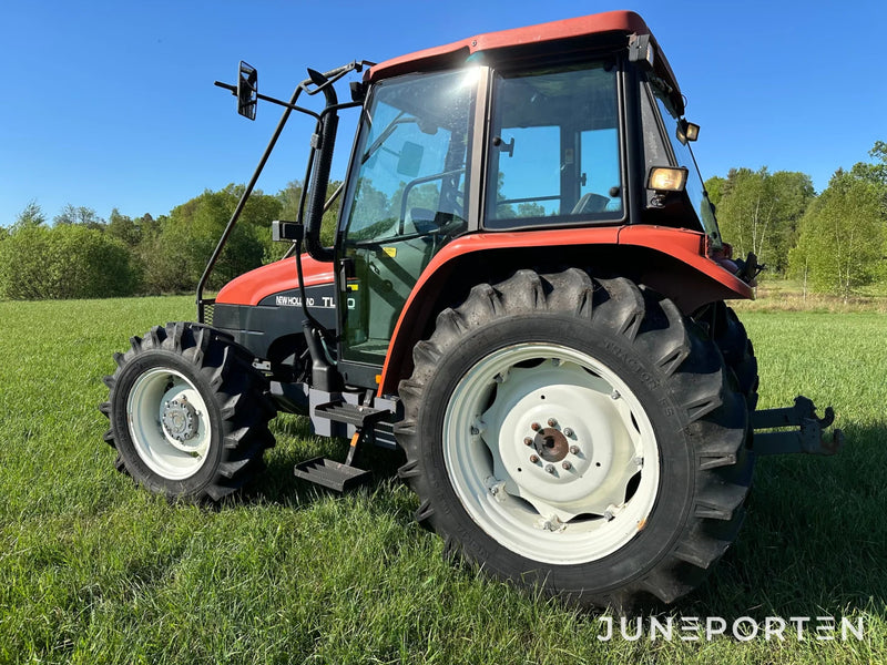 Skogsutrustad New Holland TL80 4WD